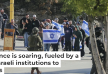 Israeli settlers gather near the Kiryat Arba settlement in Hebron on Dec. 10, 2025. Mosab Shawer/Middle East Images/AFP via Getty Images, CC BY